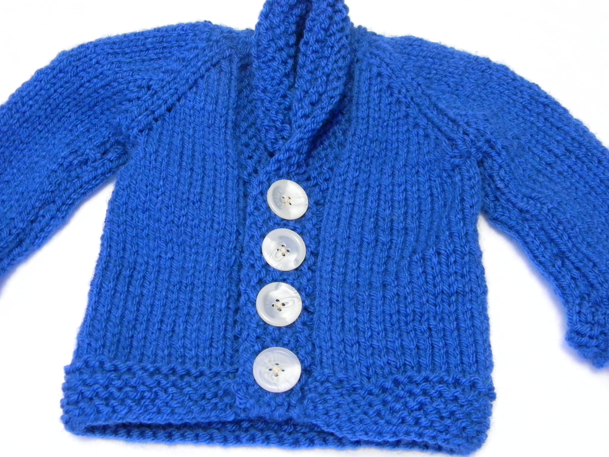 Cabled Raglan Baby Sweater -
 Knitting Daily